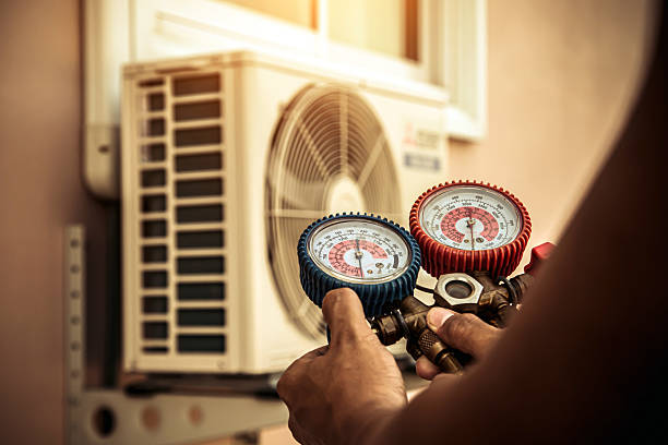 Professional Hvac Installation technician working in Brookline Village, MA